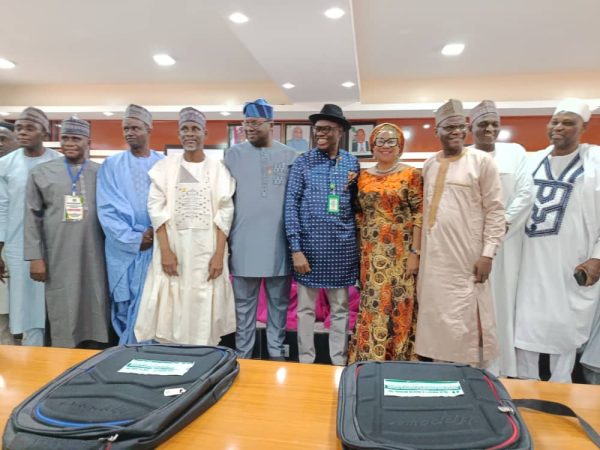 Provost flanked by the President of SSUCOEN Cmrd Danladi Ali Msheliza on one side and in the other side by the ES NCCE Prof Chijioke Okwelle, the C…